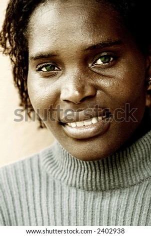 African young woman, wrinkles enhanced, white balance changed for the gold look