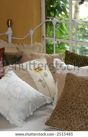Colonial interior design, iron bed, embroidery pillows