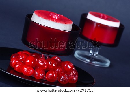 Luxury strawberry cheesecake with glassed cherries and scones on the side; food series; in IPTC status, instructions, you will find the recipe