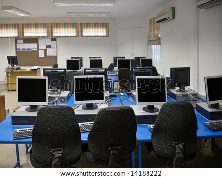 Computer classroom with plenty desktops and TFT screens