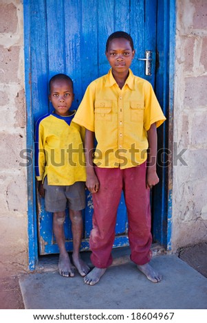 african family, two brothers, living  in a very poor village near Kalahari desert