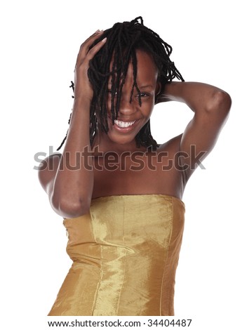 stock photo : young African woman with gold dress and braids