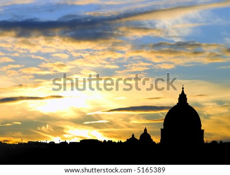 Rome, Italy - Cityscape silhouette with the saint peter basilica at sunset