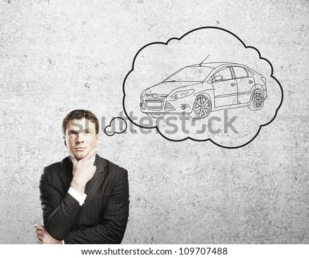 man thinks about a new  car