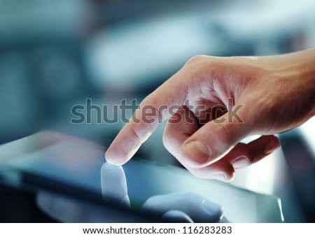 Hand Presses On Screen Digital Tablet