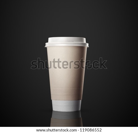Paper cup of coffee isolated on black background