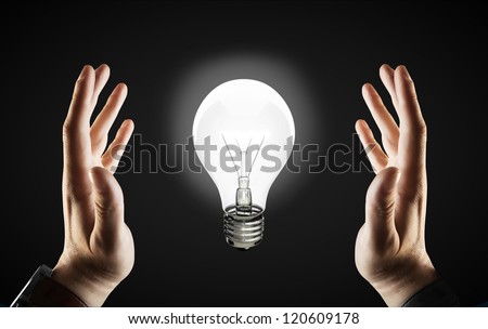 businessman and lamp in hand