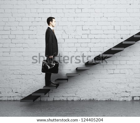 man stepping up a staircase