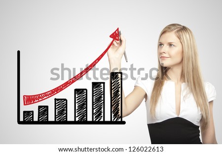businesswoman drawing growth of chart