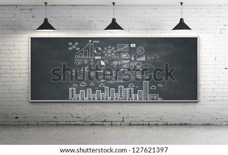 Business Strategy On Blackboard In Room