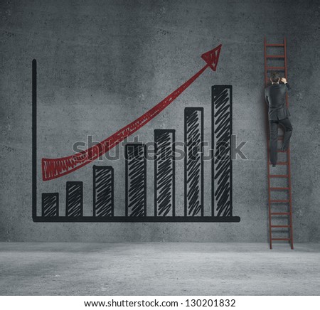 man climbing on ladder and business chart