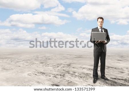 businessman with notebook on nature background