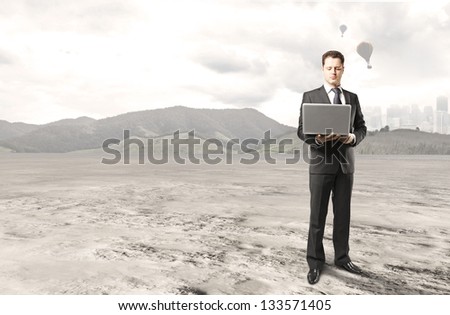 businessman with notebook on nature background