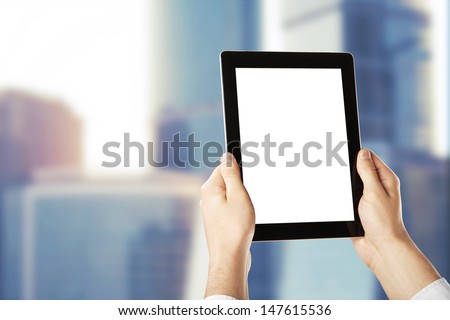 hands holding a blank  tablet