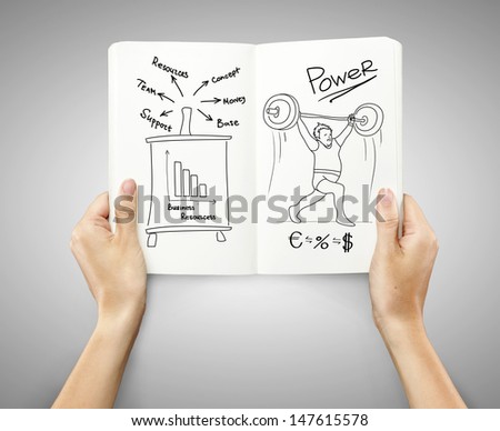 hand holding book with bussiness concept