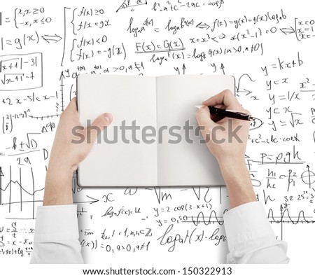 hands drawing in book on a formulas  background