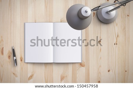 opened book on the table with lamp