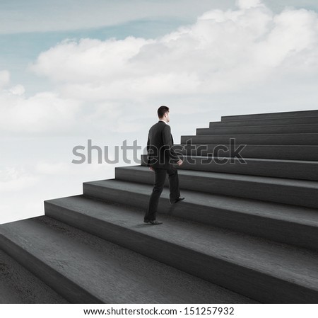 man walking near ladder in sky