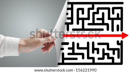 hand turns gray page with maze