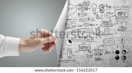 hand turns page with concept