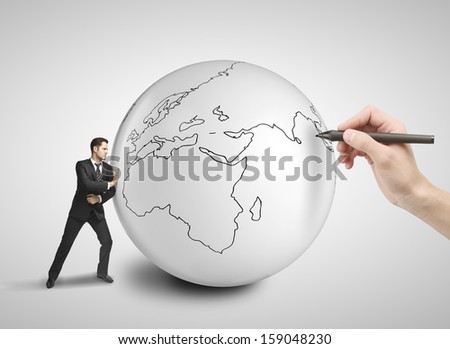 businessman pushing big ball with drawing world map