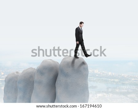 businessman falls into the abyss