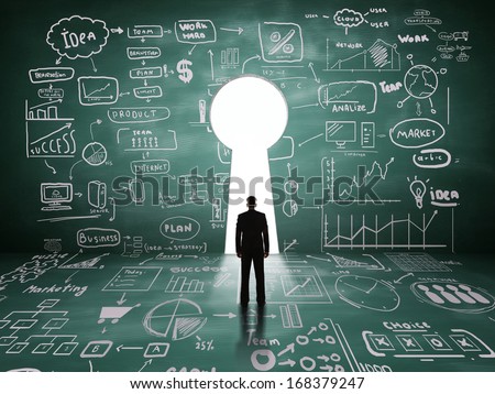 Businessman Looking At Key Hole Door, Business Concept