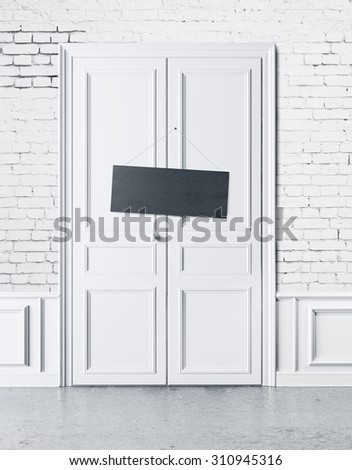 white door with an empty plate