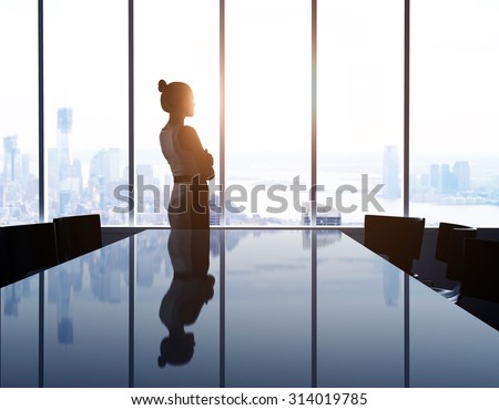 woman looking at modern city