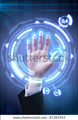 Technology scan man\'s hand for security or identification.Hand with scanner and computer interface