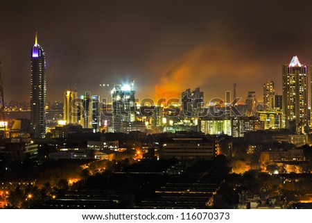Bombay, India - March 4, 2011: Bandra Station Ablaze With Plumage Of Flames And Smoke High Into The Night Sky