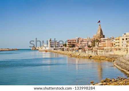 Landscape of Dwarka Bay, Arabian Sea and promenade from public pathway leading to Shree Dwarakadheesh Krishna Temple a religious place and pilgrimage for hindus on the coast of Gujarat, India