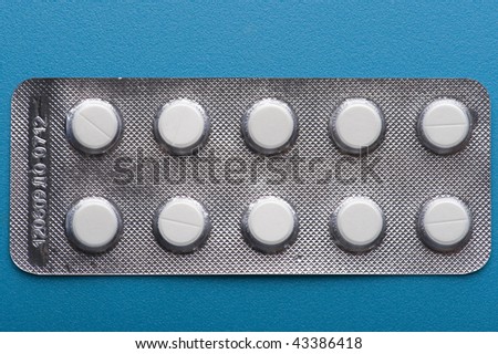 object on blue - medical Tablet close up