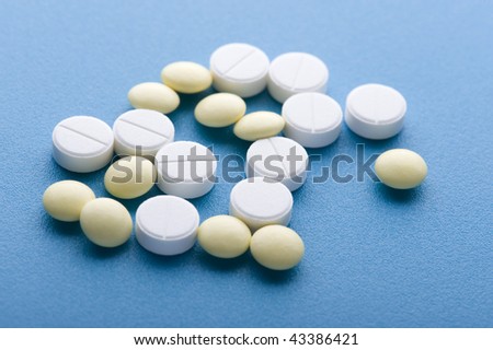 object on blue - medical Tablet close up