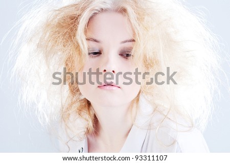 Portrait of sensual woman with fluffy hair.