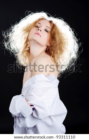 Portrait of sensual woman with fluffy hair.