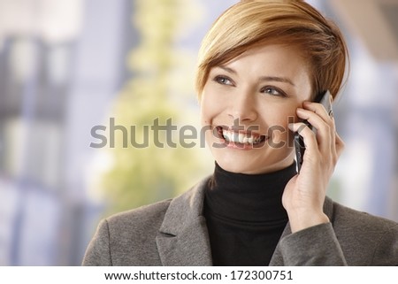 Outdoor Portrait Of Happy Businesswoman Talking On Mobile Phone, Smiling.