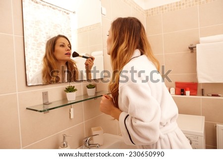 Young woman preparing makeup in the morning.
