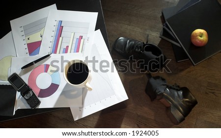 Typical business objects: colored graph, a cut of caffee, files and a mobile... etc.