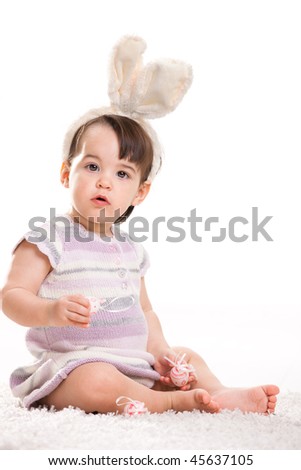 202 New baby headband bunny ears 58 Baby girl with bunny ears headband, playing with easter eggs, isolated   