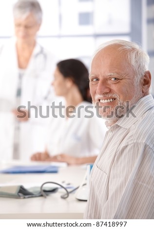 Mature man on health control in doctor\'s room.?