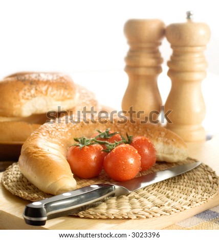 Snack of bread and cherry tomatoes.