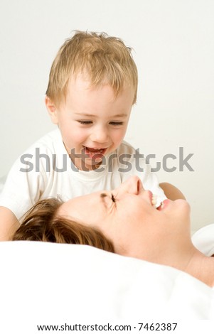 Mother and toddler sharing happy moment
