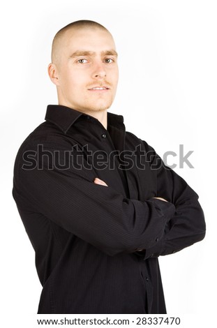 Isolated man in black shirt with crossed arms on white background
