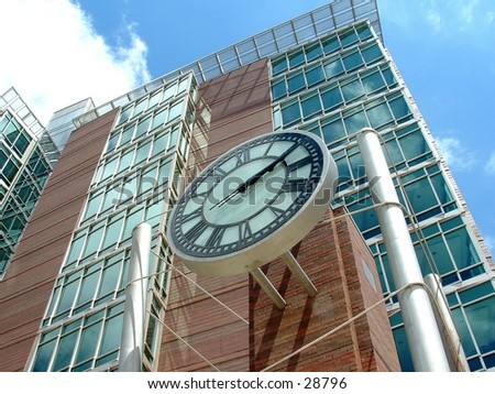 clock on a building in downtown Grand Rapids