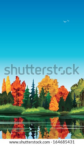 Autumn nature landscape with colored trees and lake.