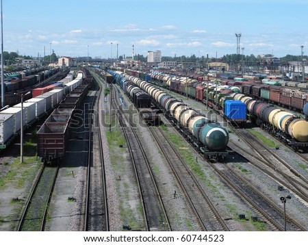Railway yard with a lot of railway lines and freight trains