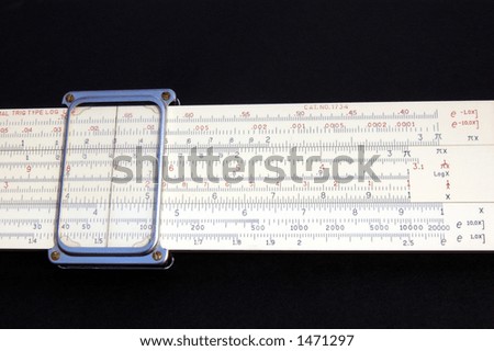 Slide Rule traditionally used for calculations by scientists and engineers. The image is strongly associated with science, mathematics, engineering, technical excellence, and precision.