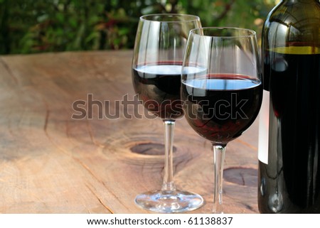 Bottle & Glasses of Red Wine on Table