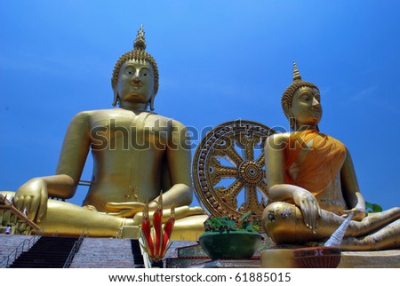 Two big statue image of buddha meditation at Wat Muang,Angthong,Thailand